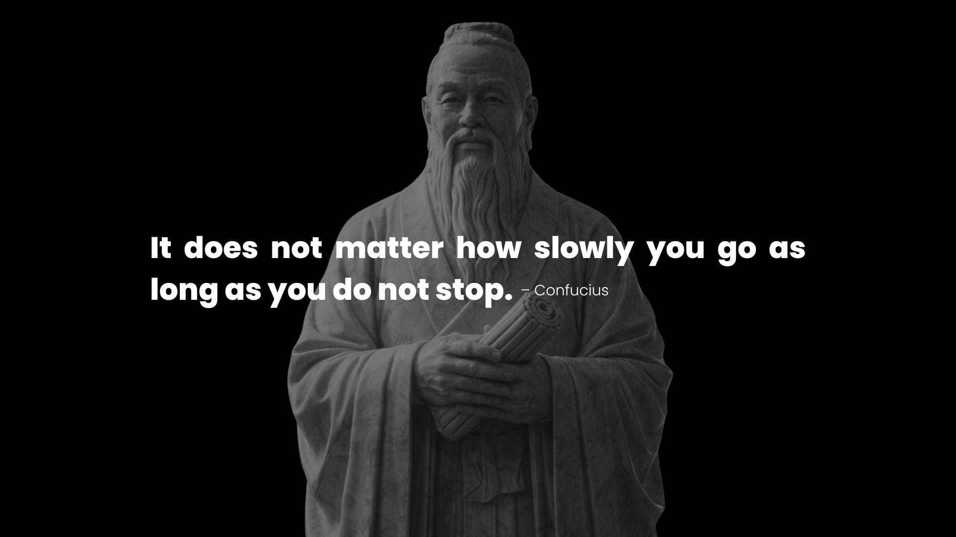 Sculpture of Confucius with a patience quotes about steady progress.