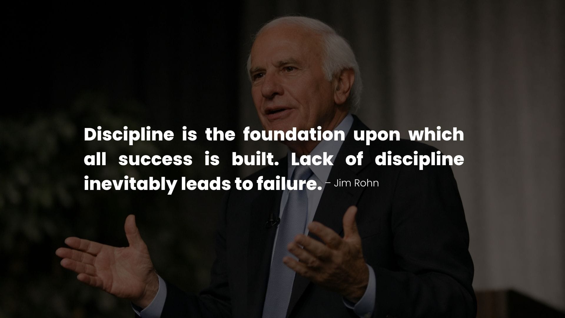 Jim Rohn Giving Speech with a Quote